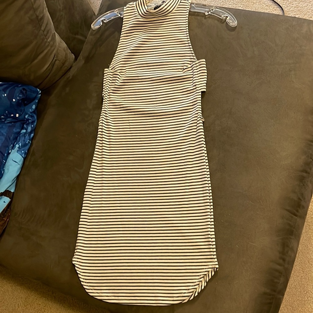 Lulu’s turtle neck sleeveless dress with side cut-outs